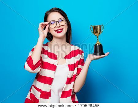 Young Smiling Woman With Cup Trophy