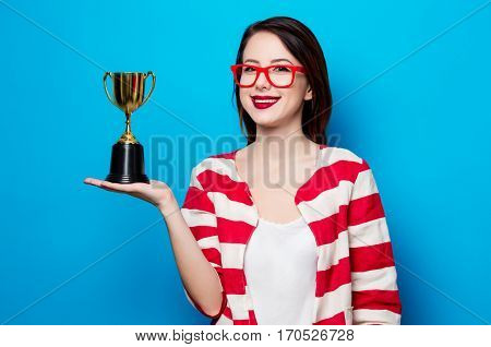 Young Smiling Woman With Cup Trophy