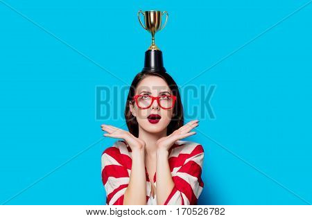 Young Surprised Woman With Cup Trophy