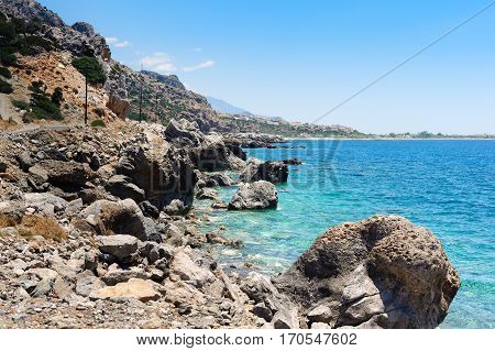 Rocky coastline with turquoise lagoon near Paleochora town on Crete island, Greece
