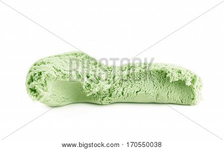 Single slice of kinetic sand isolated over the white background