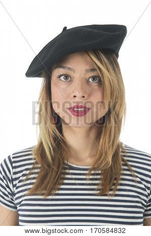Young French girl with typical French barret and striped shirt isolated over white background