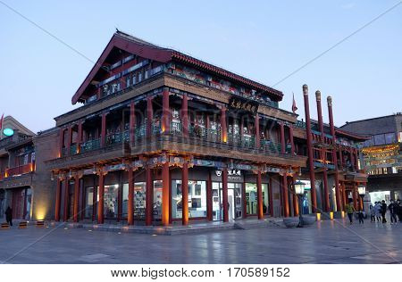 BEIJING - FEBRUARY 22: Qianmen street, a famous old shopping street over hundreds years in Beijing, China, February 22, 2016.