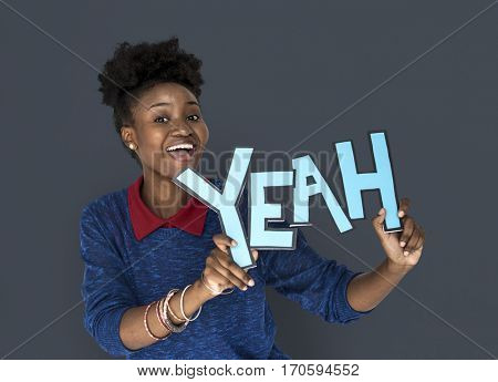 Smiling African Woman Holding Yeah Word