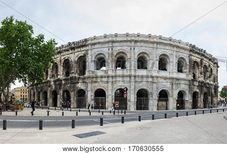NIMES FRANCE - MAY 04 2015: Ancient Roman Theater (Arena) of Nimes. Nimes is a famous and very popular among tourists city in Provence in south of France