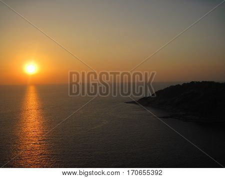 Sunset on the most souhern point of Phuket island Thailand