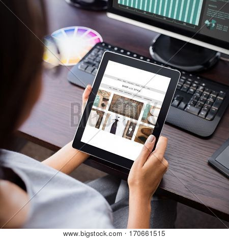 website frontpage against woman watching her tablet computer