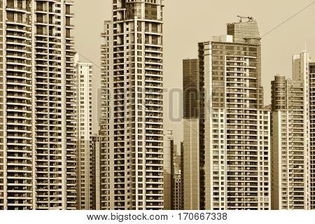 Pudong district skyscrapers in Shanghai China. Pudong is a district of Shanghai located east of the Huangpu River. Sepia toned photo