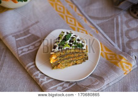 Pie Beef Liver With Onions And Tuschenym Markovka On A Plate Decorated With Mayonnaise. Liver Cake.