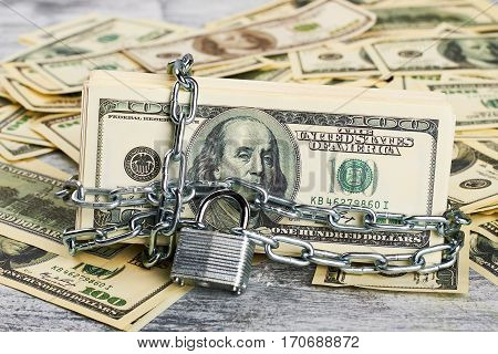 Money under lock and key. Create financial security.