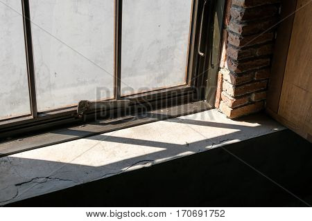 Shadow of Sunlight from outside pass window .