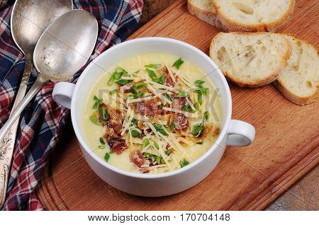Creamy Loaded Baked Potato Soup with Bacon and Cheesegreen onions