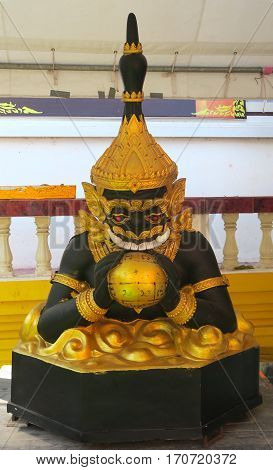 Black Statue at the Temple in Thailand
