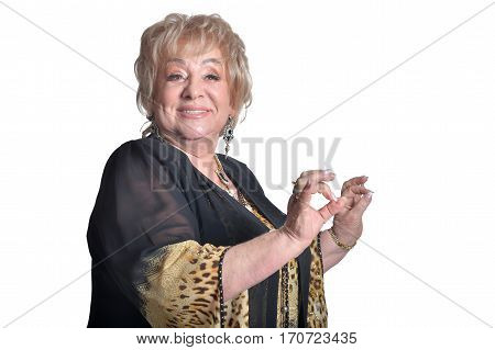 gorgeous mature woman posing against white background