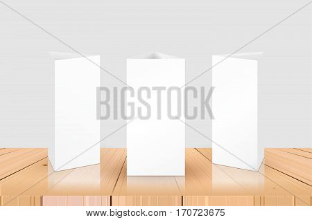 Blank Table Tent isolated on wooden table background. Paper vertical triangle cards on white background with reflections. Front. left and right view. Vector illustration.