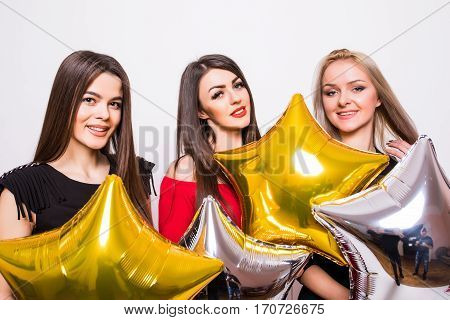 Three Smiling Gourgeous Girls With Balloons In Night Dresses