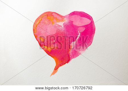 Photo of a pink heart drawn by water color.