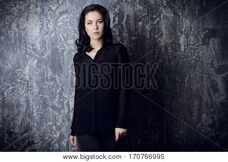 Portrait of a beautiful young woman with brunette hair. Beauty, fashion concept. Cosmetics.