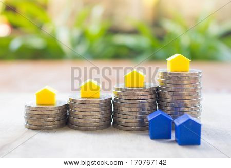 Business investment growth conceptsaving conceptsaving for house conceptpay by instalmentsbuy the housebuy the house wood and green background