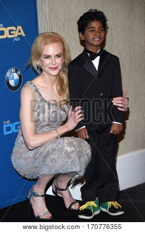 LOS ANGELES - FEB 04:  Nicole Kidman and Sunny Pawar in the press room at the 69th Annual DGA Awards on February 4, 2017 in Beverly Hills, CA                