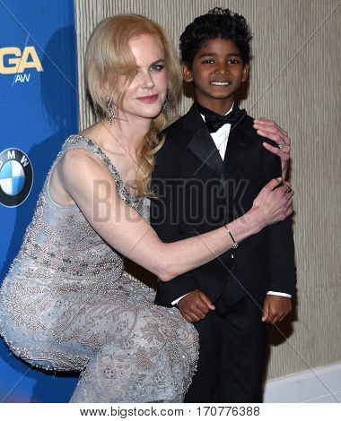 LOS ANGELES - FEB 04:  Nicole Kidman and Sunny Pawar in the press room at the 69th Annual DGA Awards on February 4, 2017 in Beverly Hills, CA                