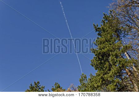 Mountainside in Lozen mountain with air track and forest at the top, Pancharevo, Bulgaria