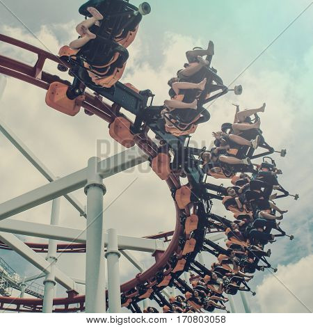 Rollercoaster ride at theme park vintage style