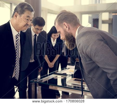 Business Partners Introductionary Handshake Bow