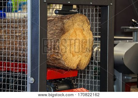 Woodworking machine in action. Timber cutting machine. Wood processing equipment