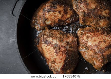 Butter Chicken in a sausepan on a table horizontal