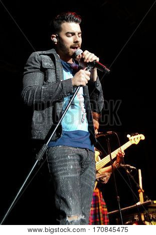 HUNTINGTON, NY-FEB 8: Joe Jonas of DNCE performs onstage at the Paramount on February 8, 2017 in Huntington, New York. 