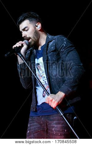 HUNTINGTON, NY-FEB 8: Joe Jonas of DNCE performs onstage at the Paramount on February 8, 2017 in Huntington, New York. 