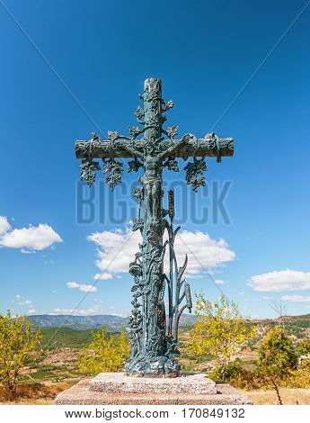 Mirabel France - september 6 2016: Crucifixion of Christ in front of the village overlooking the mountains of the Ardèche.