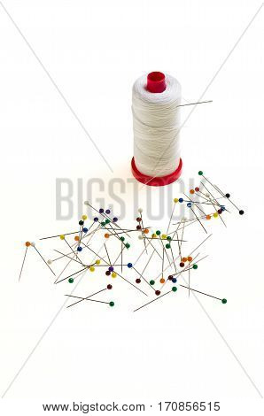 Background with a Multitude of Pins with the Head in Various Colors isolated in white