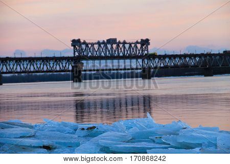 Bridge across river Dnieper at sunset in Kremenchug, Ukraine