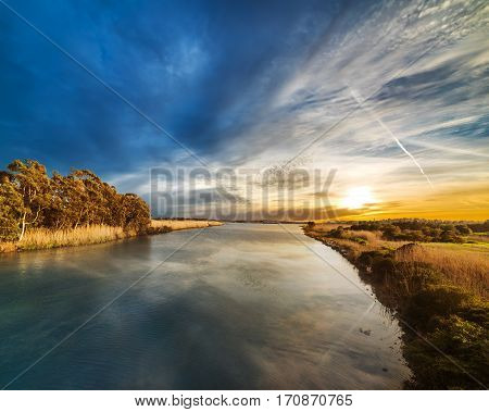 a colorful sunset in Calik lagoon Sardinia