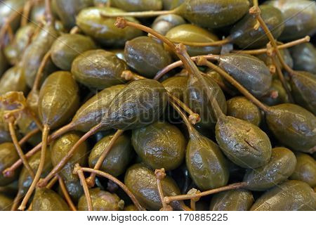Green Pickled Big Capers Close Up Background