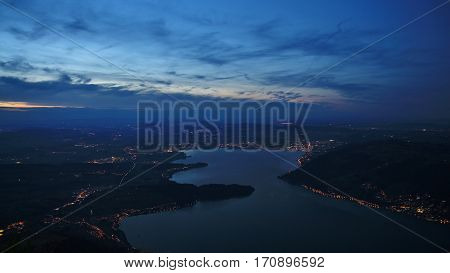 Lake Zugersee and Zug by night view from mount Rigi.