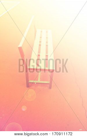 Close up green chair in the tennis court.