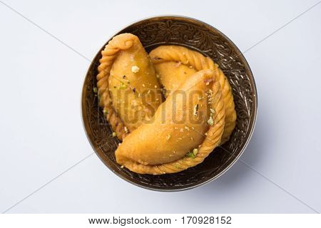 Gujiya - sweet dumplings made during the festival of holi and diwali, selective focus
