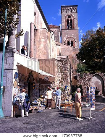 RAVELLO, ITALY - SEPTEMBER 23, 1996 - Tourist gift shop in the town square with a church tower to the rear Ravello Amalfi Coast Italy Europe, September 23, 1996.