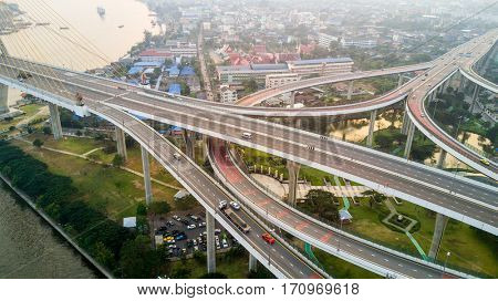 Aerial view of a large road interchange at the Bhumibol bridge in Bangkok, Thailand