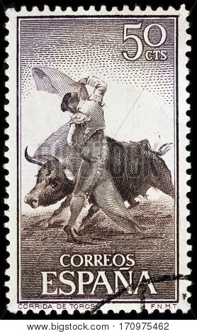LUGA RUSSIA - FEBRUARY 7 2017: A stamp printed by SPAIN shows beautiful scene of Spanish-style bullfighting circa 1960