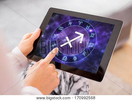Sagittarius zodiac sign map on tablet computer