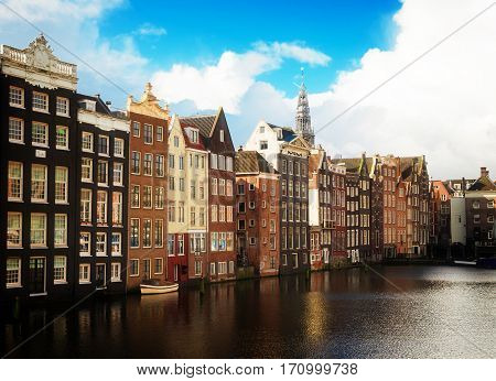 Typical dutch houses over canal, Amstardam, Netherlands, retro toned