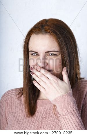Closeup Portrait Cheerful Girl With Beautiful Face And Attractive Amile. Smiling Shy Woman Covering 