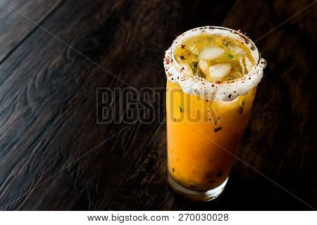 Mexican Michelada Cocktail With Beer, Lime, Ice And Spices.
Beverage Concept.