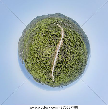 Little Planet - Spherical View Of Curvy Road Surrounded With Forest. Drone Aerial Tiny Planet