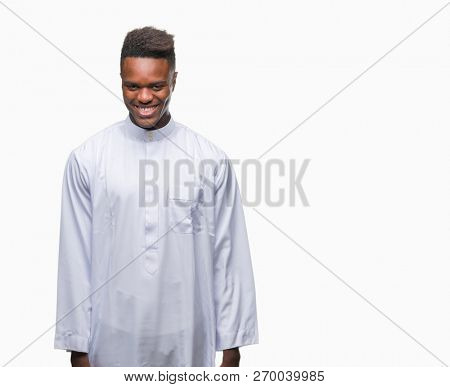 Young arabic african man wearing traditional djellaba over isolated background with a happy and cool smile on face. Lucky person.