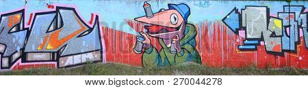 Full And Acomplished Graffiti Artwork. The Old Wall Decorated With Paint Stains In The Style Of Stre